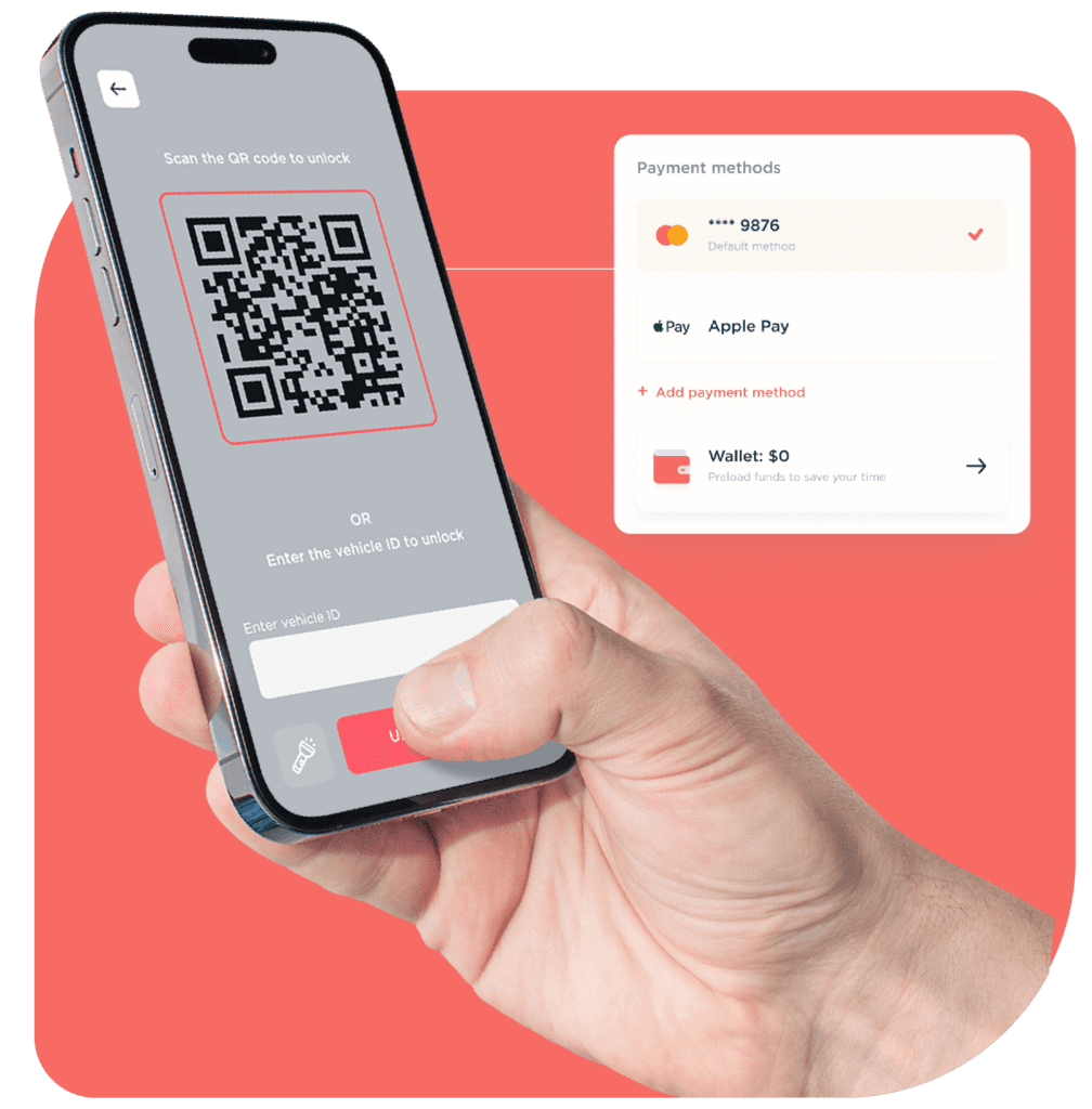 hand holding a smartphone with a QR code and a payment module to rent a vehicle